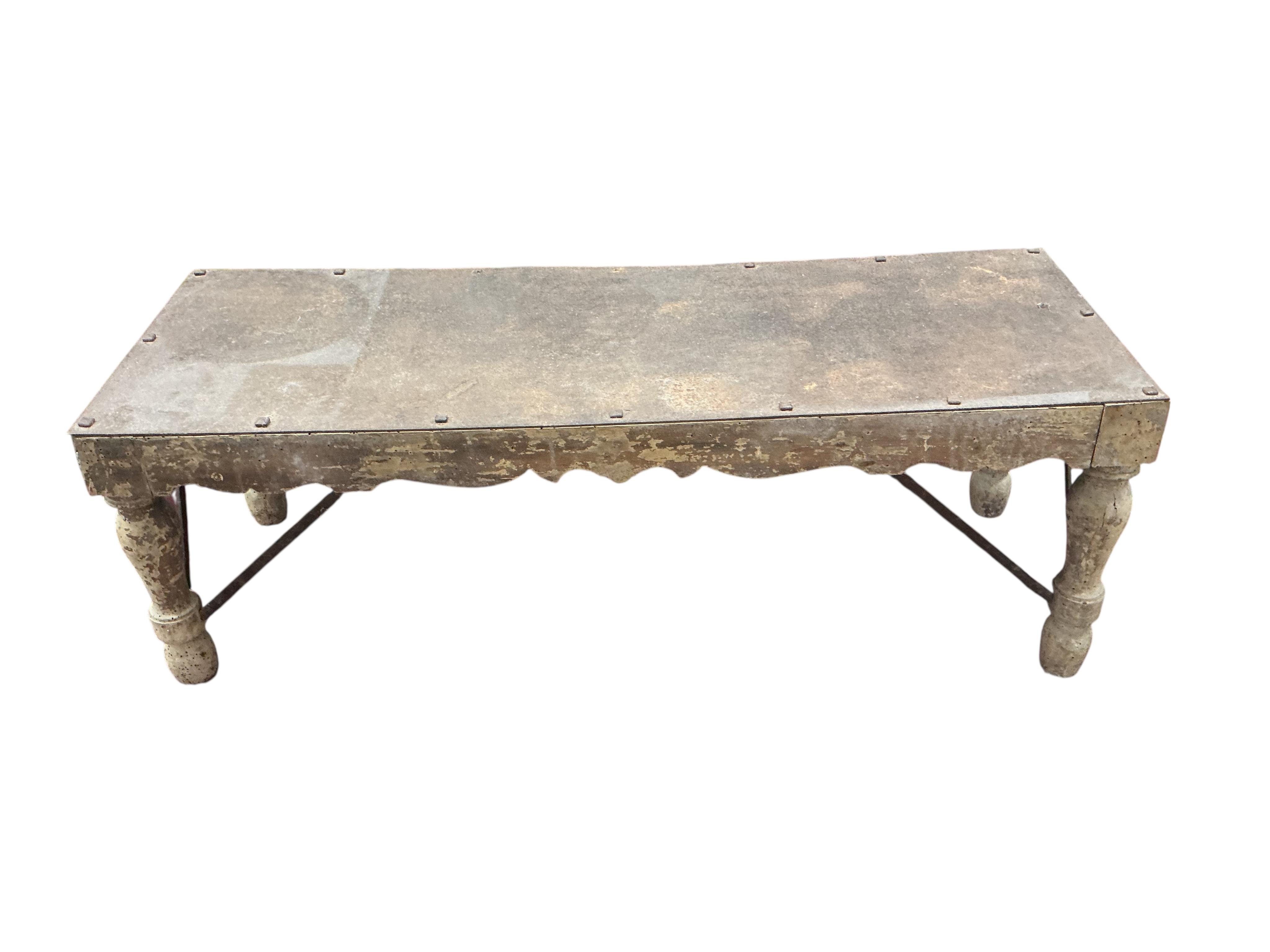A rectangular bleached wood coffee table with studded iron top, width 130cm, depth 46cm, height 46cm